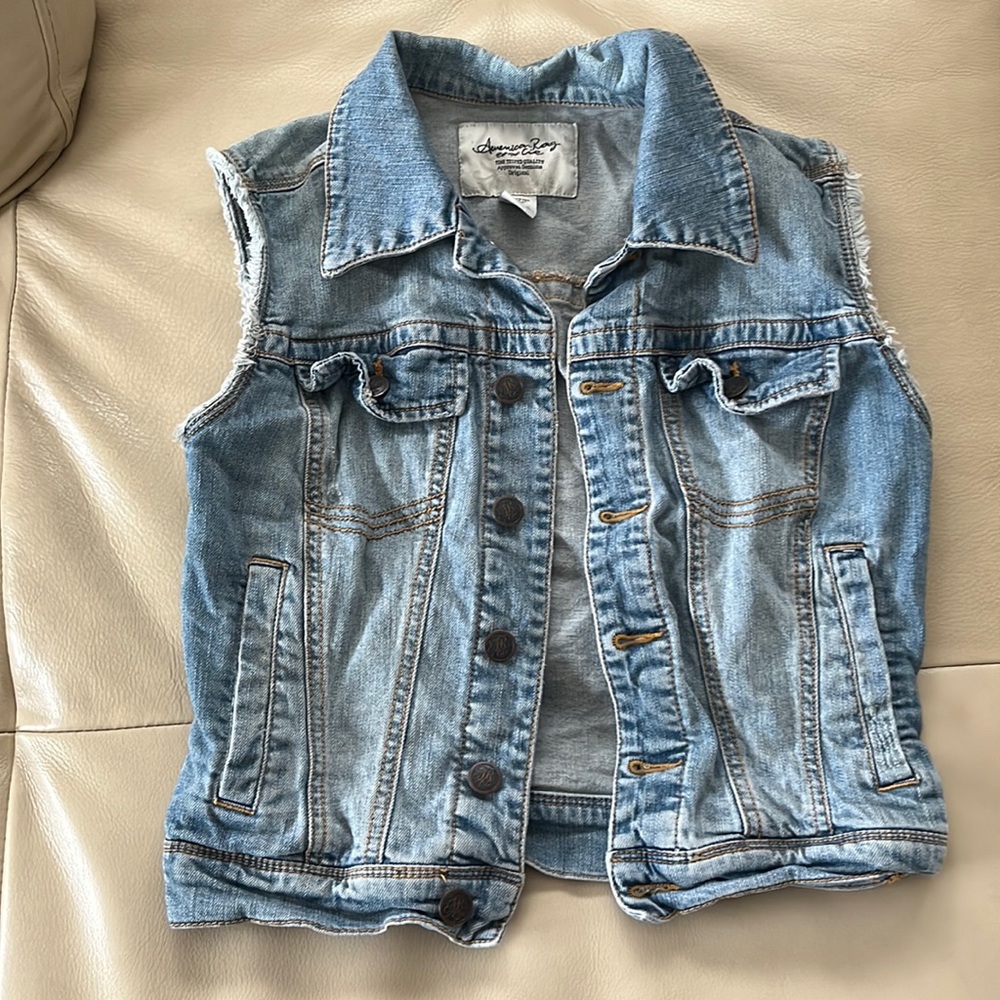 Girl jean vest.